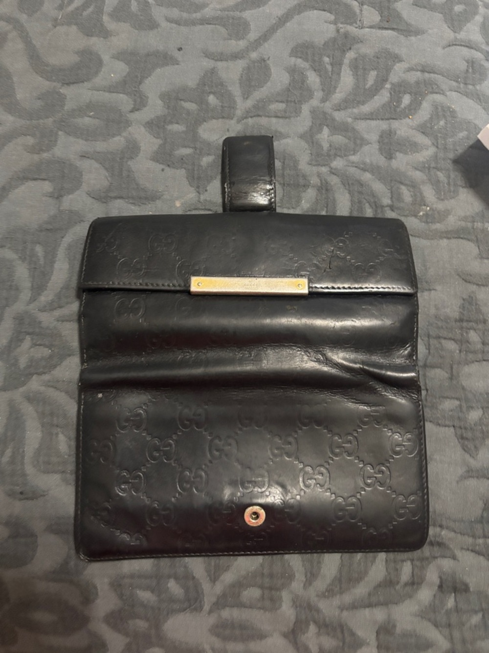 Gucci Black Embossed Leather Wallet with Gold Bar